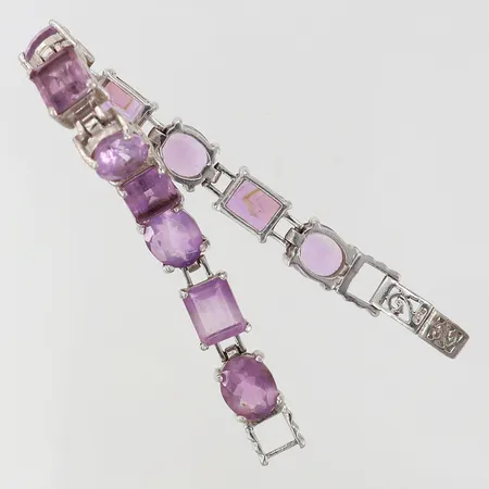 Armband med ametister längd 17,5cm bredd 8mm lås låser ej korrekt Silver 925/1000.  Vikt: 26,6 g