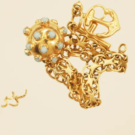 Diverse guld del av armband defekt samt stenar 18K Vikt: 5,6 g
