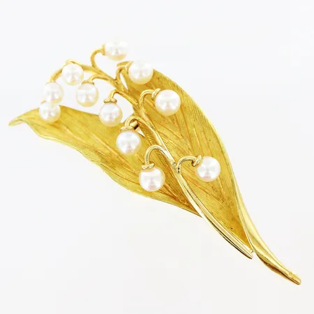 Brosch odlade pärlor Ø3,5-4mm 62x27mm rörlig del, nål i metall, 18K. Bruttovikt: 15,2gram Vikt: 15,2 g