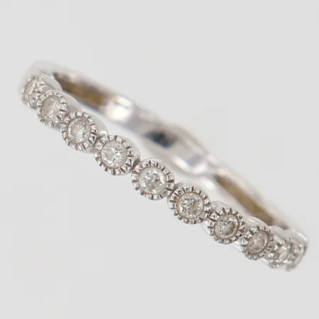 Ring med diamanter 10 x 0,02ct, stl:16½ bredd 2,3,mm 18K OBS! Ändrat Pris! Vikt: 1,7 g