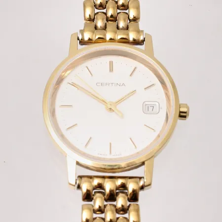 Damur Certina i 18K guld, quartz, Ø24mm, datum länk i gulmetall med 1st extralänk, viklås, handledsmått inklusive ur ca 18cm, i behov av batteribyte, inga tillbehör. Vikt: 0 g