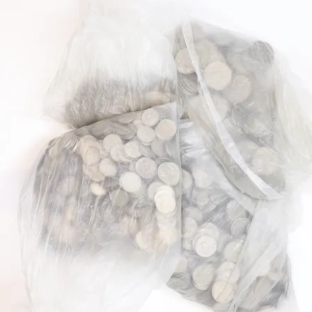 Diverse svenska mynt 1-kronor, 50-öringar, 25-öringar och 10-öringar, ej fullständigt genomgånget, troligen mestadels silver 400/1000 Vikt: 3575 g