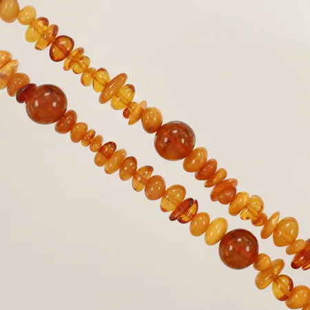 Bärnstenscollier längd ca 80cm bredd 9-15mm