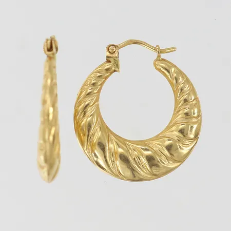 Ett par örhängen creoler Ø25mm bredd ca 3mm 18K Vikt: 4,4 g