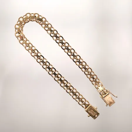 Armband x-länk med kistlås längd 19,5cm bredd 6,4mm 18k Vikt: 12 g