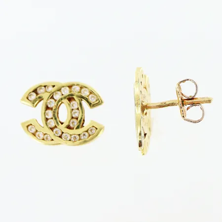 Örhängen vita stenar 10x14mm stoppar i metall, något skeva stift, OBS! Ej märkesdesign 14K. Bruttovikt: 2,3gram. Vikt: 2,3 g