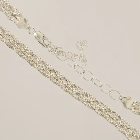Collier flätat längd 42-53,5cm bredd 7,5mm justerbar silver 925/1000 Vikt: 19,5 g