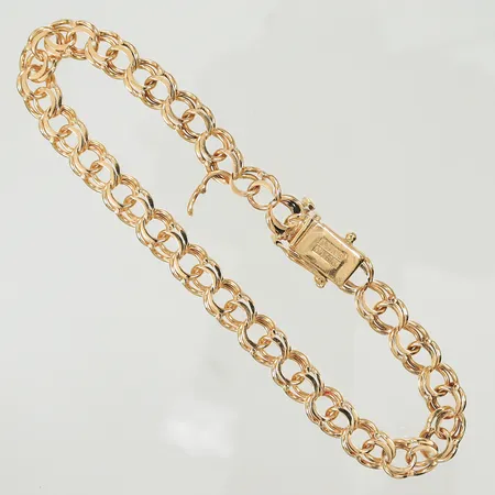 Armband Bismarck längd 20,5cm, bredd 6mm, defekta länkdelar, saknar en låsåtta, 18K, 13,2g Vikt: 13,2 g
