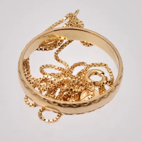 Diverse defekt guld, 18K, 6,98g.