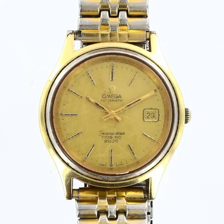 Herrur Omega Seamaster Cosmic 2000, automatisk, Ø38mm, datum, guld på stål, flexband, Etui slitage, monogramgravyr, slitage på förgyllningen, repor och märken