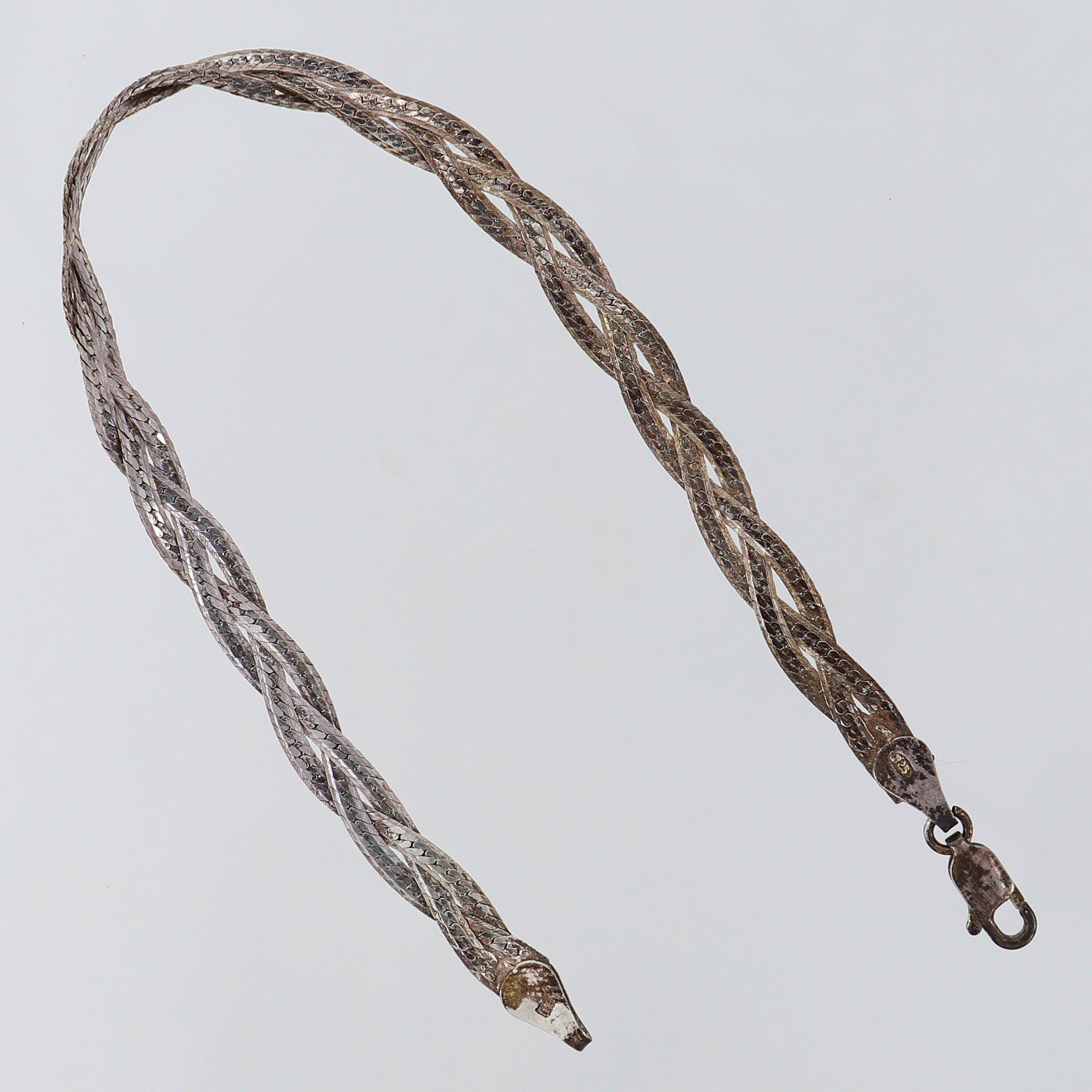 Armband flätad längd 18,5cm bredd 4,5mm Silver 925/1000. Vikt: 3,9 g