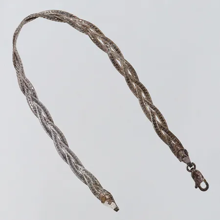 Armband flätad längd 18,5cm bredd 4,5mm Silver 925/1000. Vikt: 3,9 g