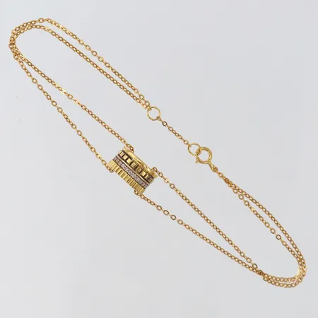 Armband tvåradigt med integrerat hänge med stenar längd ca 18,5-20cm bredd 0,9-6mm 21K. Vikt: 3,8 g
