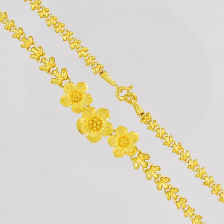 Collier med blommor thaiguld längd 42cm bredd 6-16,8mm 2 baht 23K Vikt: 30,4 g