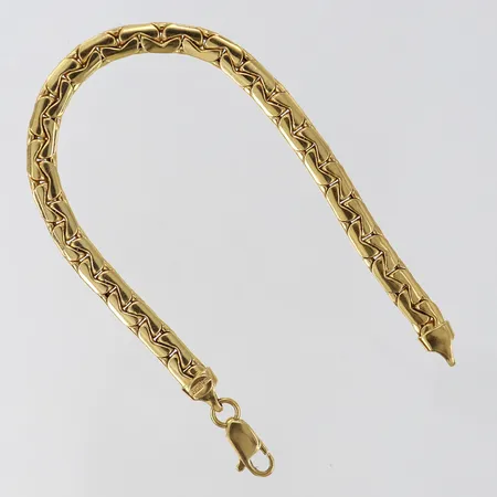 Armband manglad pansar längd 19,5cm bredd 5,5mm GHA 18K. Vikt: 10 g