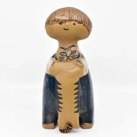 Figurin Pelle Lisa Larsson höjd 20cm defekt lagad hals