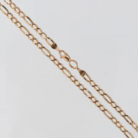 Kedja Figaro längd 54,5cm bredd 3,2mm ihålig bucklig 14K. Vikt: 4,3 g