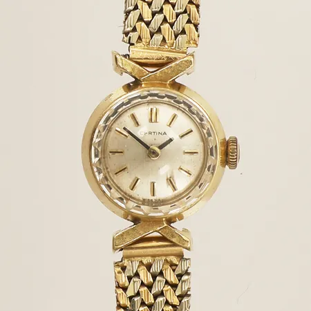 Damur Certina guld manuell Ø16mm armband inklusive boetten 17,5cm skadad urtavla 18K i armband trefärgat 18K i boetten bruttovikt 27,1g