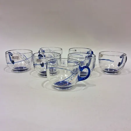 Glöggmuggar sju stycken Olle Rosén för Kolmården Design handmålade av Elisabeth Alf höjd 5cm, Ø65mm, med kartong, fåtal etiketter med slitage Skickas med paket.