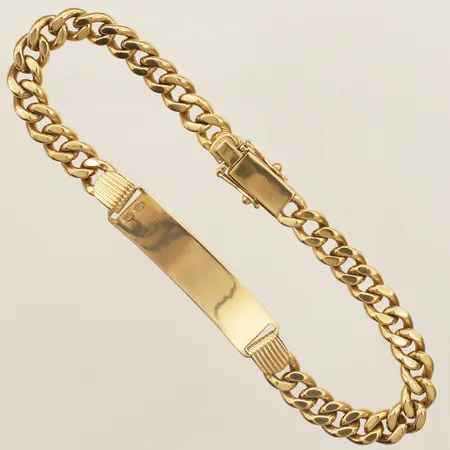 Armband med namnbricka längd 20,5cm bredd 8,4mm namngravyr 18K Vikt: 30 g