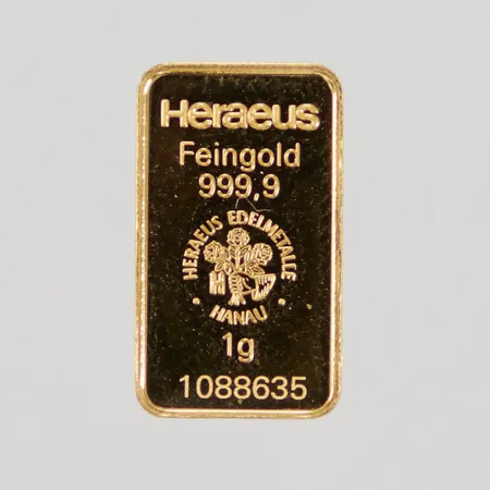 Guldtacka Heraeus 24K 1g, bruten förpackning, nr 1088635, kvitto från Reisebank Tyskland
