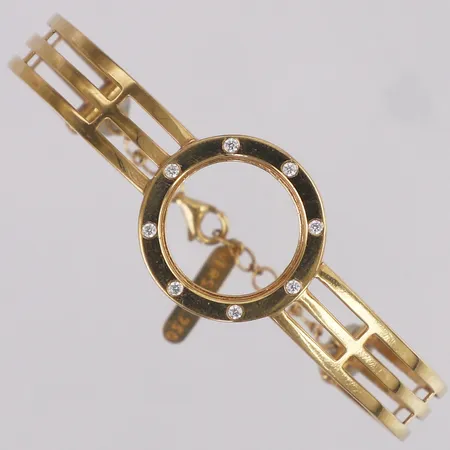 Armband stelt vita stenar bredd ca Ø60x50mm, OBS! ej märkesdesign, 18K Vikt: 9,1 g