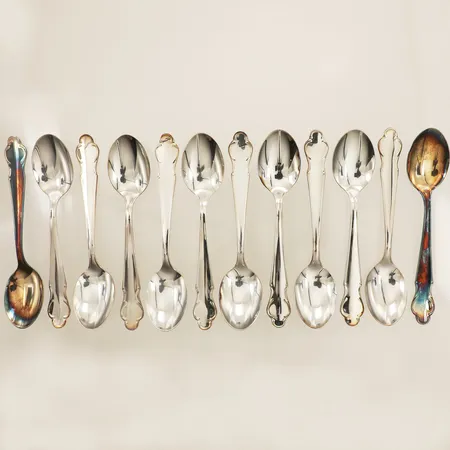 Tolv kaffeskedar modell Disa 12cm graverade silver Vikt: 198,5 g