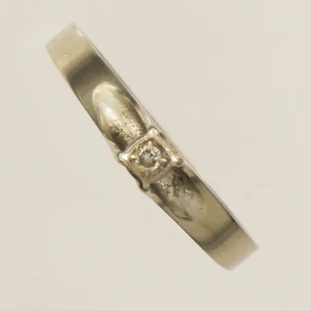 Ring med diamant 1xca0,005ct stl:18¼ bredd 3,5mm Pettersson Ab Olof år 1978 Stockholm vitguld 18K Vikt: 1,7 g