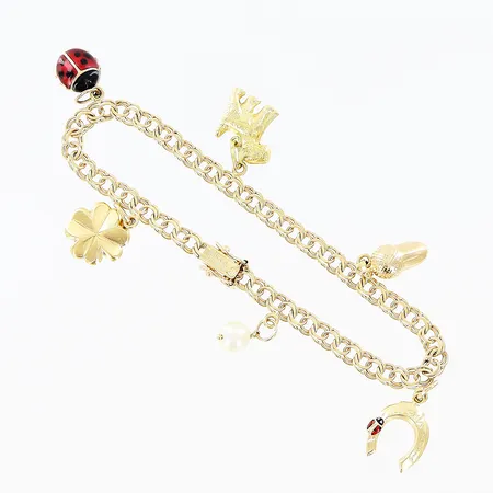 Armband Bismarck längd 19cm bredd 4,5mm, 6 berlocker, 18K Vikt: 11,9 g