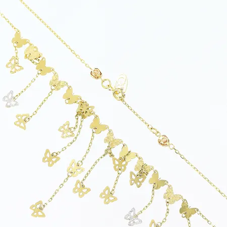 Collier med intrasslade hängen längd 44,5cm bredd 1-40mm, detaljer i vitguld, 18K Vikt: 5,7 g
