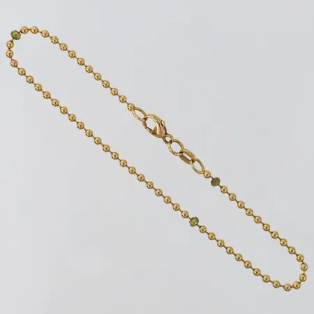 Armband kullänk längd 19,5cm bredd 2mm fåtal med emalj med slitage 18K. Vikt: 3,2 g