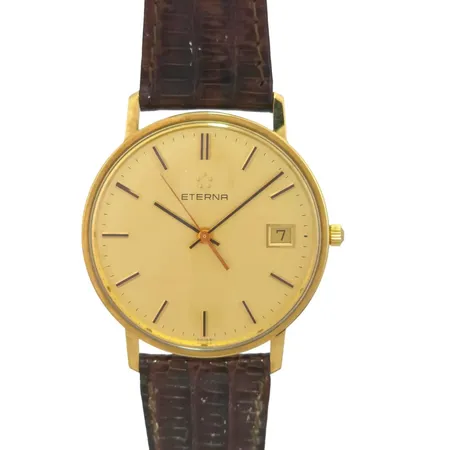 Herrur Eterna, 14K guld, Ø33,5 mm, quartz - behov av nytt batteri, original skinnband - slitage, repa i glaset, originalbox, 23,7g Vikt: 23,7 g