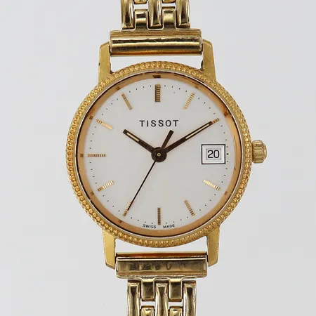 Damur Tissot 18K quartz länk i doublé gravyr går ej 18K.