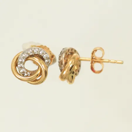 Ett par örhängen tvåfärgad med vita stenar, Ø 7mm, 18K Vikt: 1,2 g