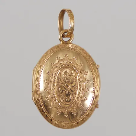 Medaljong / Fotogömma, längd inklusive ögla 31mm, bredd 17,3mm, mönsterdekor, Bruttovikt: 3,9g.