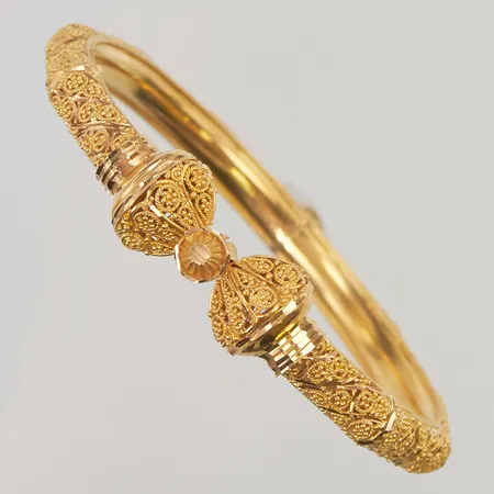 Stelt armband, innermått: 60x55mm, bredd: 6,9mm, 21K, 24,0g.