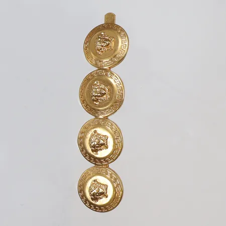 Hårspänne Versace i gulmetall längd 65mm 