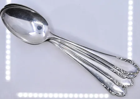 4 skedar, modell Haga, längd 21,5 cm, silver 830/1000. Vikt: 234,9 g