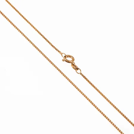 Kedja Venezia i 18K guld. Den är 42 cm lång, 1 mm bred och väger 3,5g. Springring. 