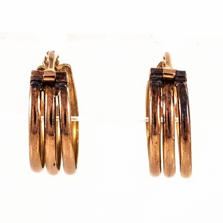 Creoler Ø 14 mm i 14K guld. De är 5 mm breda och väger 1,4g. 