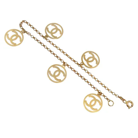 Armband, 21K guld - 875/1000, ej märkesdesign, längd 18,0 cm, bredd 2 mm, berlockernas diameter 13 mm Vikt: 4,1 g