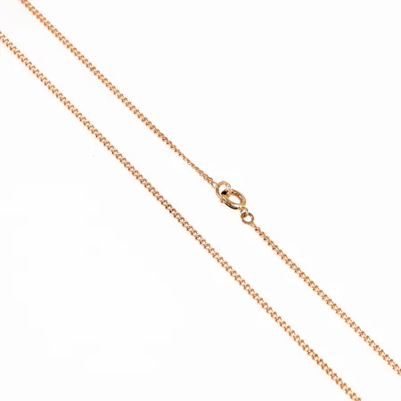 Kedja Pansar i 14K guld. Den är 60 cm lång, 1,5 mm bred och väger 4,6g. Springring. 