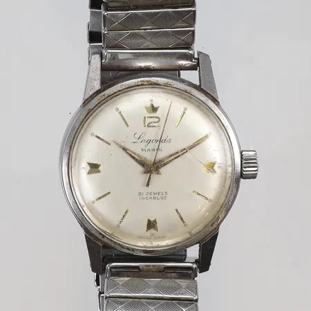 Herrur Lagonda Marin Ø34mm boett nr. 5306, manuell uppdragning, flexlänk, med repigt sprucket glas, ca 1960-tal, med slitage, möjligen servicebehov 