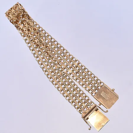 Armband X-länk, längd 19,5 cm, bredd 12 mm, 18K. Vikt: 25,8 g