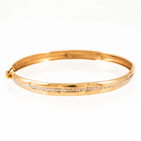 Defekt armring i 18K. Vikt: 5,3g. 