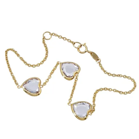 Armband, 18K guld, Ankarlänk med integrerade Hjärtan, vita stenar, längd knäppt 16,5 cm / 18,0 cm, kedjans bredd 1,3 mm, hjärtanens storlek 8 x 13 mm, fint skick, stenar utan anmärkning Vikt: 2,7 g