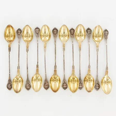 12 kaffeskedar, delvis förgyllda, ca 12cm, 1800/1900-tal, nysilver, gravyr Vikt: 0 g