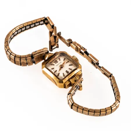 Defekt smyckeur Certina i 18K guld med band i metall. Bruttovikt: 15,4g. 