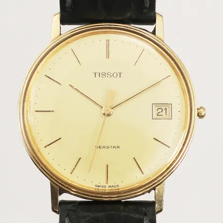 Herrur Tissot Seastar 14K, quartz, 33,5mm, datum, utbytt krona, repigt plexiglas och boett, går ej, läderarmband, inga tillbehör. 
