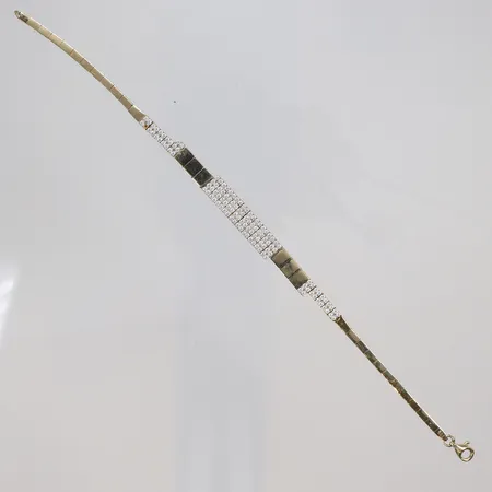 Armband med vita stenar, längd 18,5cm, bredd 2-6mm, sten saknas, 14K, bruttovikt 7,1g Vikt: 7,1 g